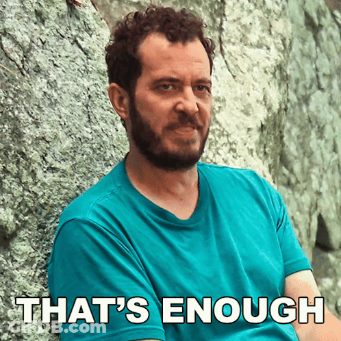 Man Leaning Against Rock Saying That's Enough GIF