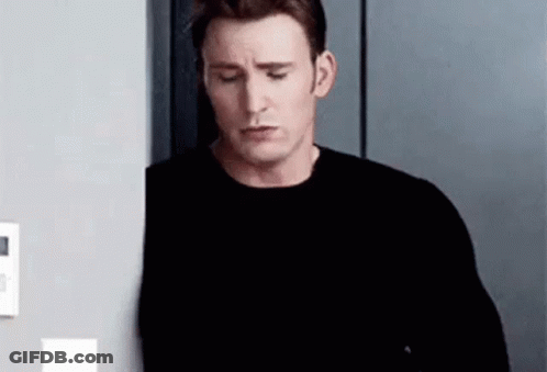 Man Leaning Against Wall GIF