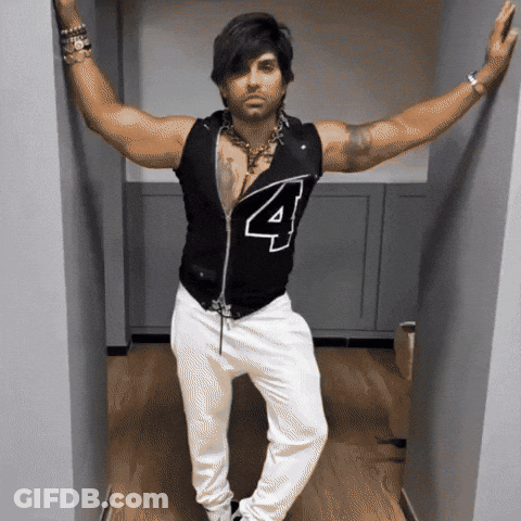 Man Leaning Against Wall In Black Shirt Number 4 GIF