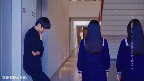 Man Leaning Against Wall Number 201 GIF