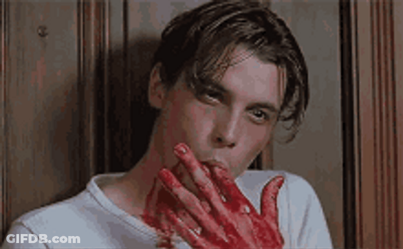 Man Licking Blood GIF