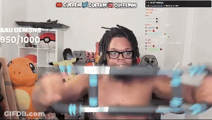 Man Lifting Barbell In Front Of Bau Demons Screen GIF