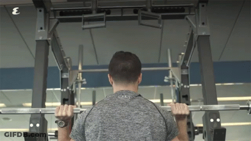 Man Lifting Barbell In Gym With Letter E GIF