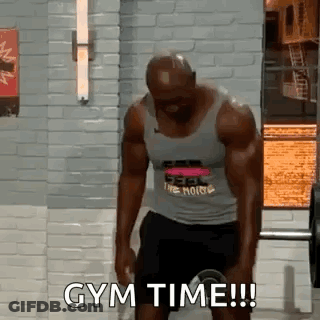 Man Lifting Barbell Saying Gym Time GIF