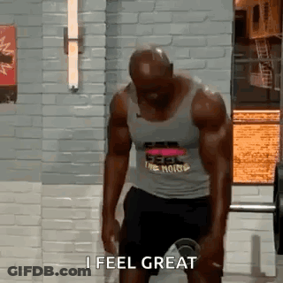 Man Lifting Barbell Saying I Feel Great GIF
