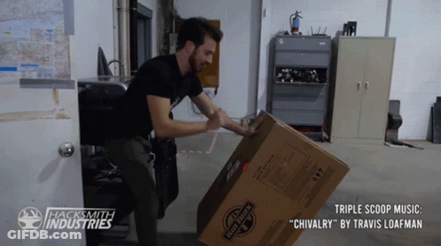 Man Lifting Chivalry Cardboard Box GIF