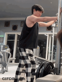 Man Lifting Weights In Plaid Pants And Black Tank GIF
