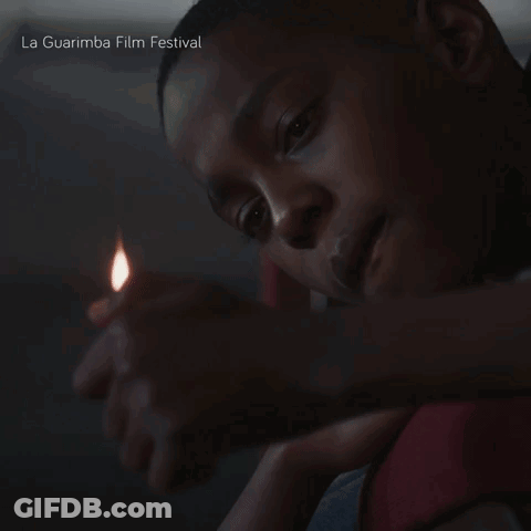 Man Lighting Candle La Guarimba Film Festival GIF