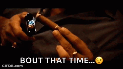 Man Lighting Cigar With Bout That Time GIF
