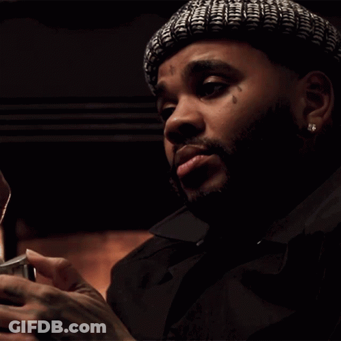 Man Lighting Cigar With Watch GIF