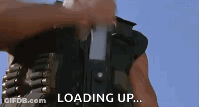 Man Loading Gun Saying Loading Up GIF
