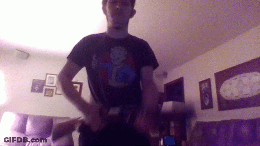 Man Loading Shotgun At Home GIF
