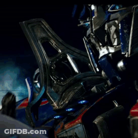 Man Looking At Blue Robot With Helmet GIF