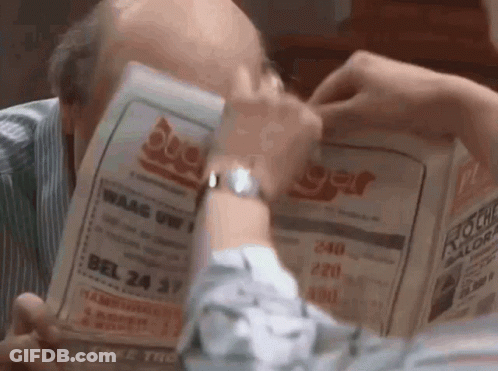 Man Looking At Burger Flyer GIF