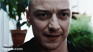 Man Looking At Camera With Plant GIF