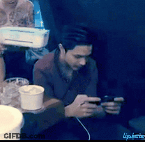 Man Looking At Cell Phone Lipnote GIF