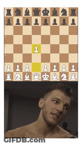 Man Looking At Chess Board With Yellow Pawn GIF