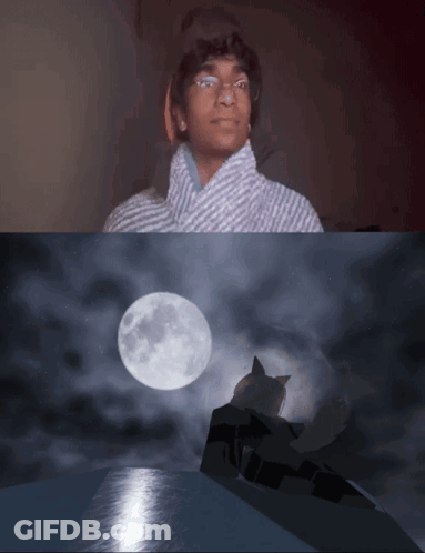 Man Looking At Full Moon While Cat Looks Down At Water GIF