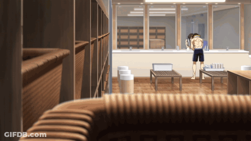 Man Looking At Himself In Locker Room Mirror GIF