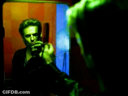 Man Looking At Himself In Mirror GIF