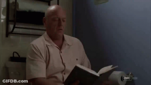 Man Looking At Paper With Eyes Closed GIF