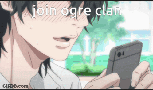 Man Looking At Phone Saying Join Ogre Clan GIF