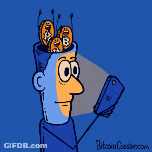 Man Looking At Phone With Coins Coming Out Of Head Bitcoincoaster.com GIF