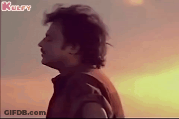Man Looking At Sun At Sunset GIF