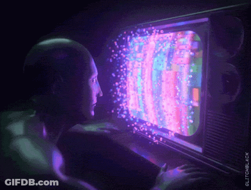 Man Looking At TV Screen Glitchblack.com GIF