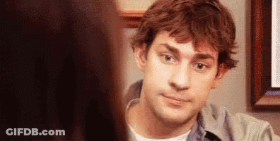 Man Looking At Woman In Mirror GIF