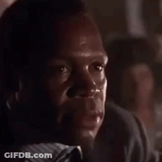 Man Looking Out Of Garage Door In Dark Room GIF