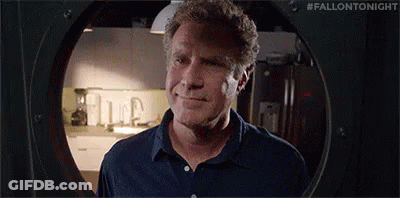 Man Looking Out Of Hole In Kitchen Wall GIF