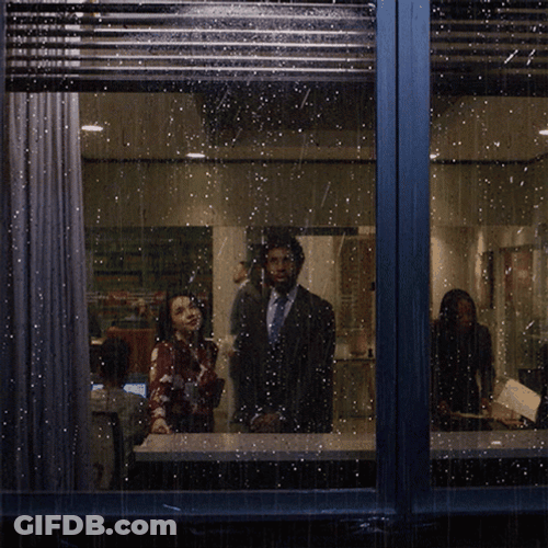 Man Looking Out The Rain On Window GIF