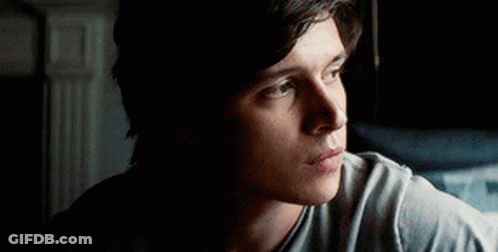 Man Looking Out Window GIF
