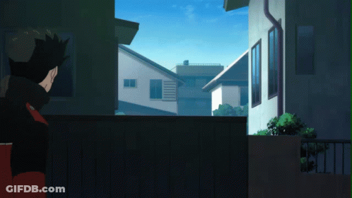 Man Looking Out Window At Cityscape GIF