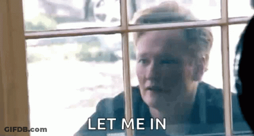 Man Looking Out Window Saying Let Me In GIF