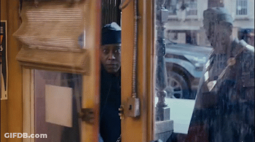 Man Looking Out Window With Free Sign GIF