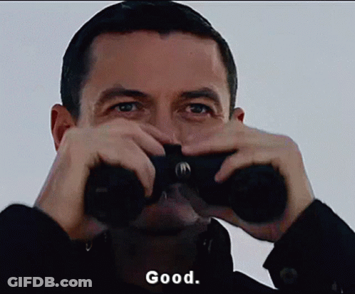 Man Looking Through Binoculars GIF