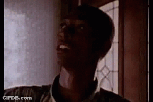 Man Looking Up In Dark Room GIF