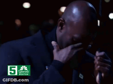 Man Looking Up In Front Of CNBC Sports Boston Sign GIF