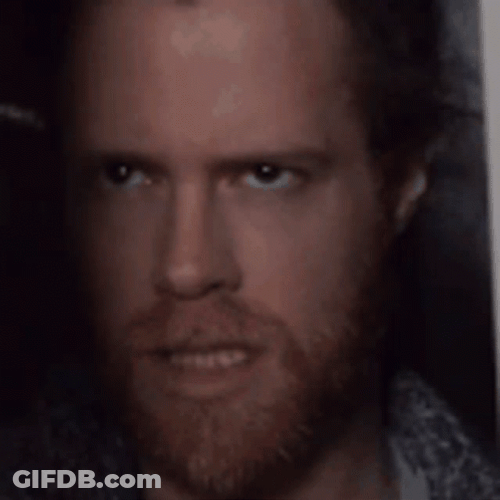Man Lurking Behind Close Door GIF