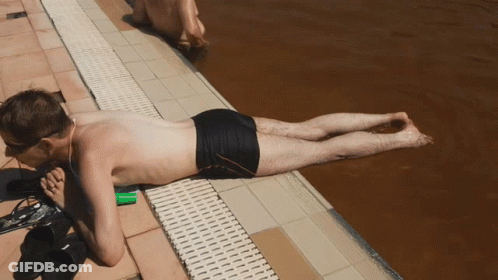 Man Lying By Pool GIF
