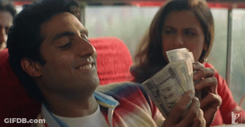Man Lying Down Woman Holding Money GIF