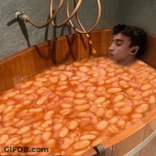 Man Lying In Baked Beans GIF