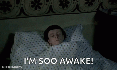Man Lying In Bed Eyes Closed Saying I'm Soo Awake GIF
