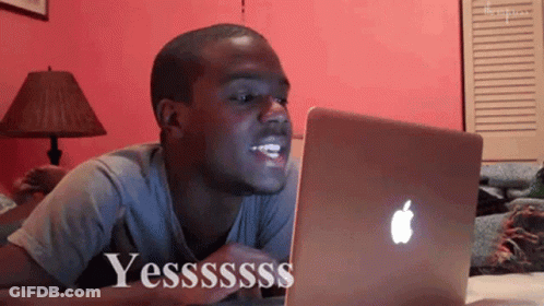 Man Lying In Front Of Apple Laptop Yesssss GIF