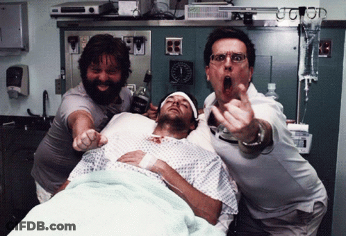 Man Lying In Hospital Bed Holding Tequila GIF