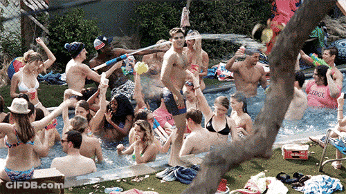 Man Lying In Pool With Champagne GIF