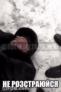 Man Lying In Snow With Head Buried GIF