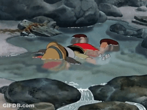 Man Lying In Water Stream GIF